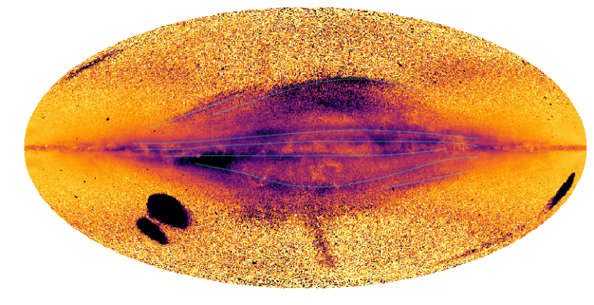 A vivid yellow, orange, pink and purple map of the Milkyway with dark black splotches seen top the left centre and far right of image.